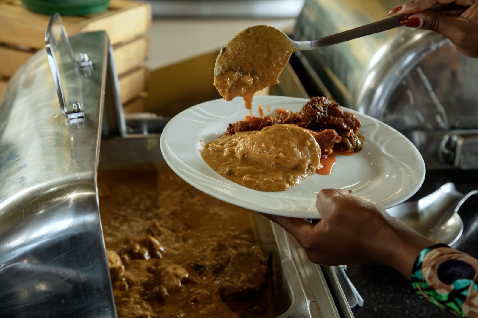 A plate being served at the buffet at The Kampala Style Brunch, June 2024