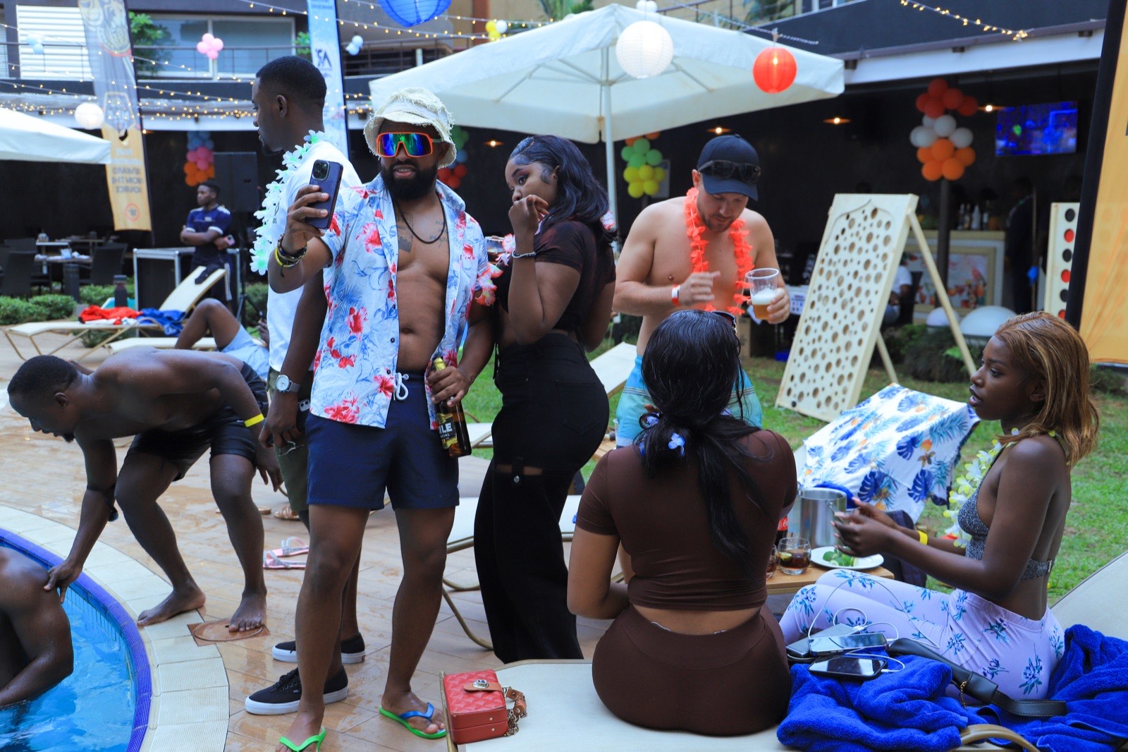 Guests on inflatables and floats during a foam pool party at Tropicanna Poolside