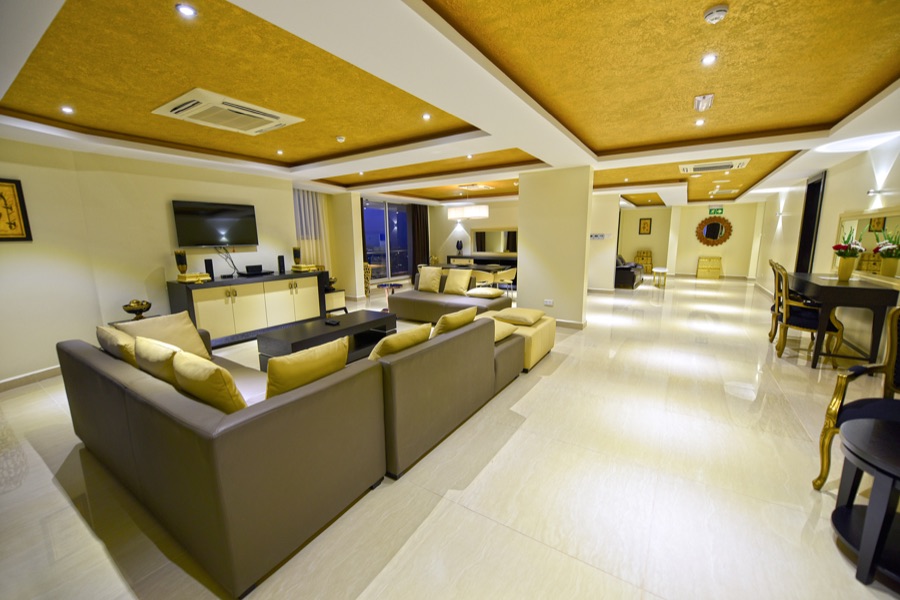 Presidential Suite living area opening onto a hallway to the bedrooms