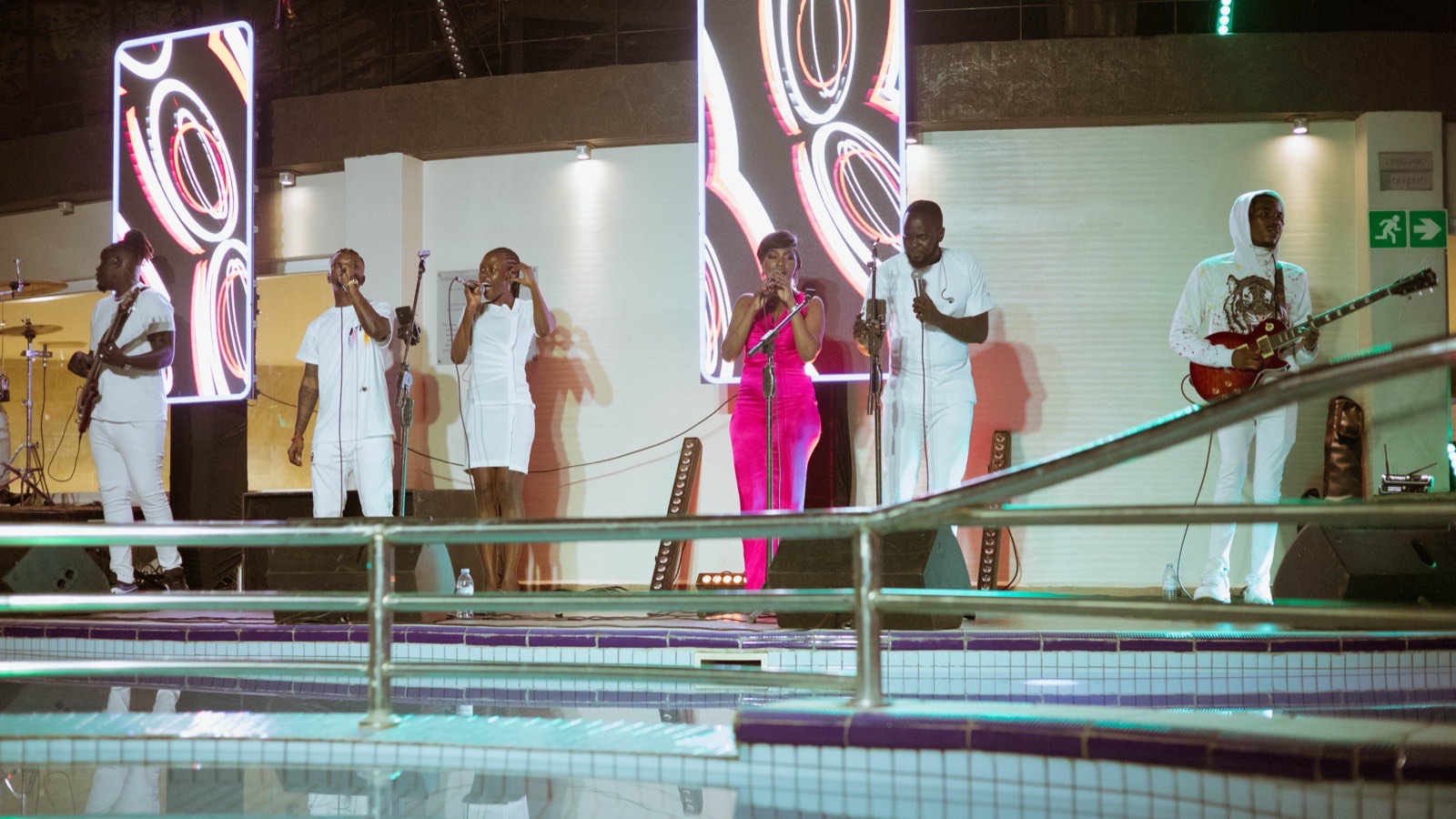 Irene Ntale under stage lights at The Skyz Exclusive