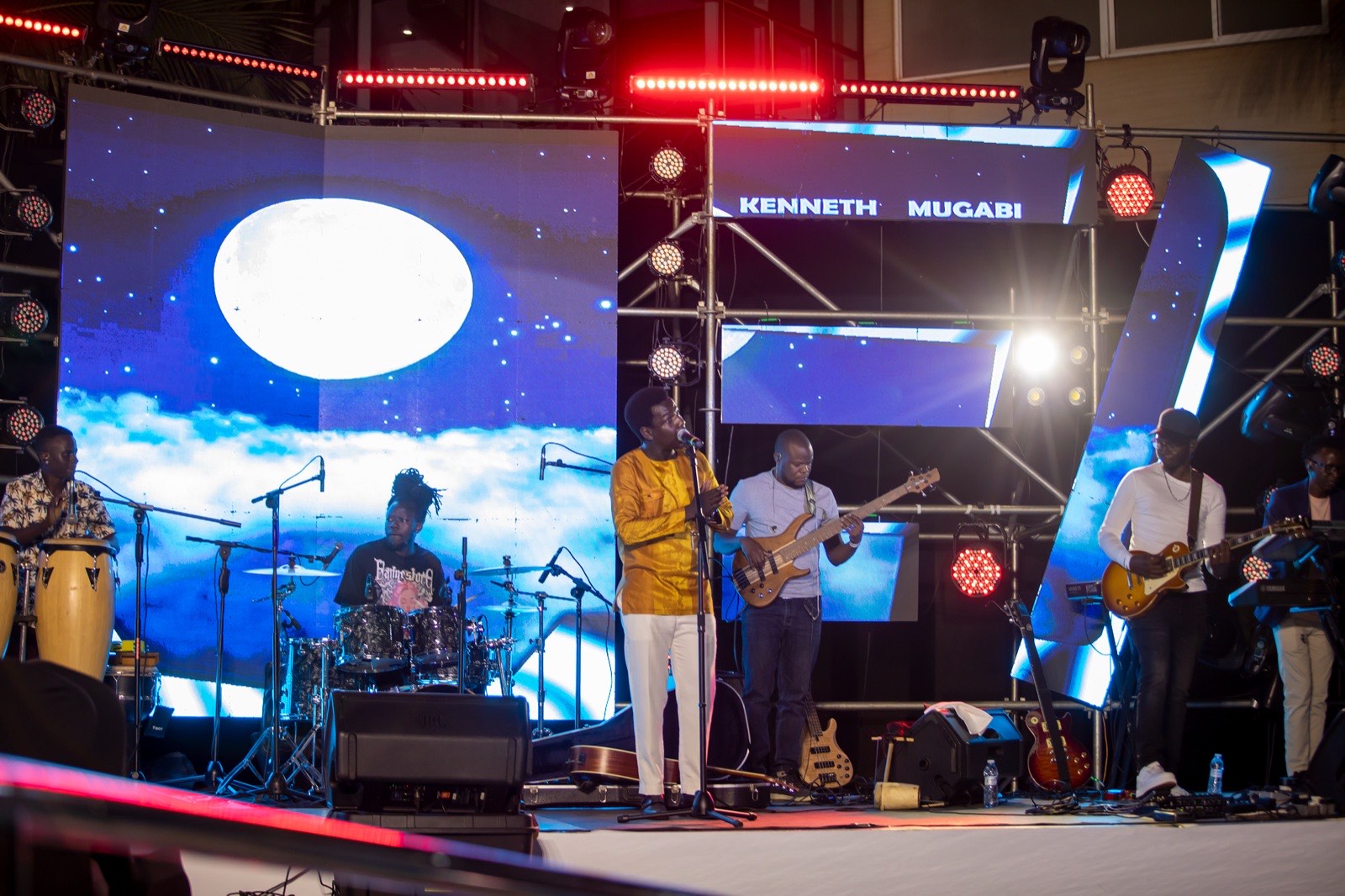 Kenneth Mugabi singing live at Tropicanna Poolside