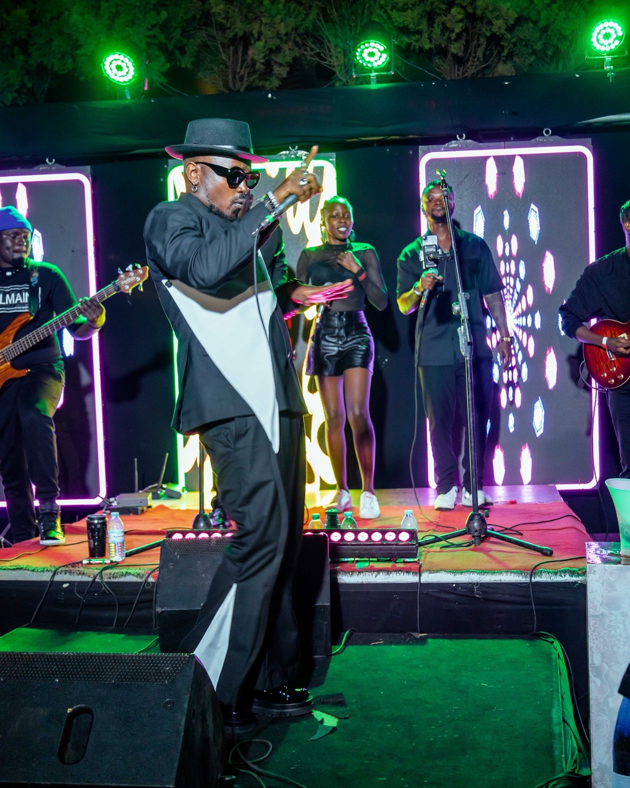 Ykee Benda performing with the live band at The Skyz Exclusive