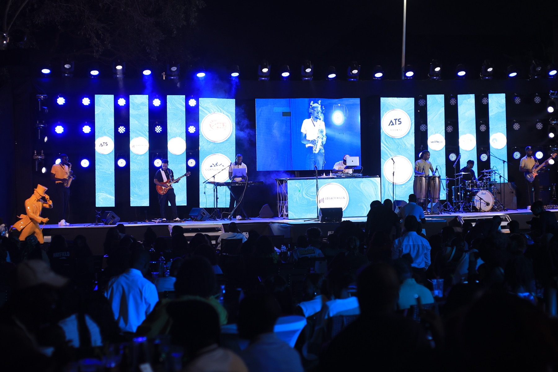 The stage and crowd at night during the Soul RNB Experience