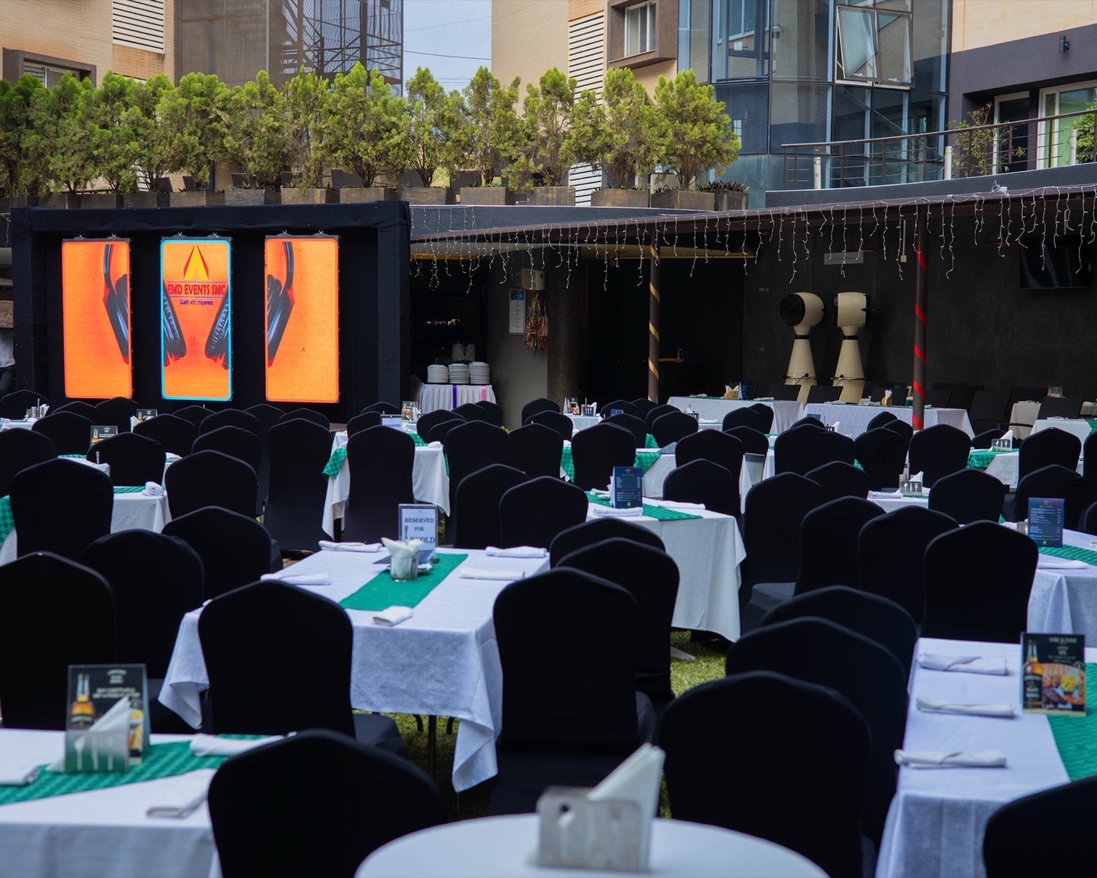 Tropicanna Poolside dining terrace set up for an evening celebration